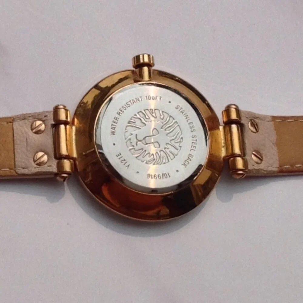 Anne Klein Quartz Wrist Watch MOP Face and Rose Gold & Arabic Numerals